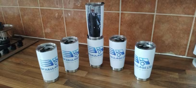 Custom branded tumblers with company logo and personal photo for team gifts